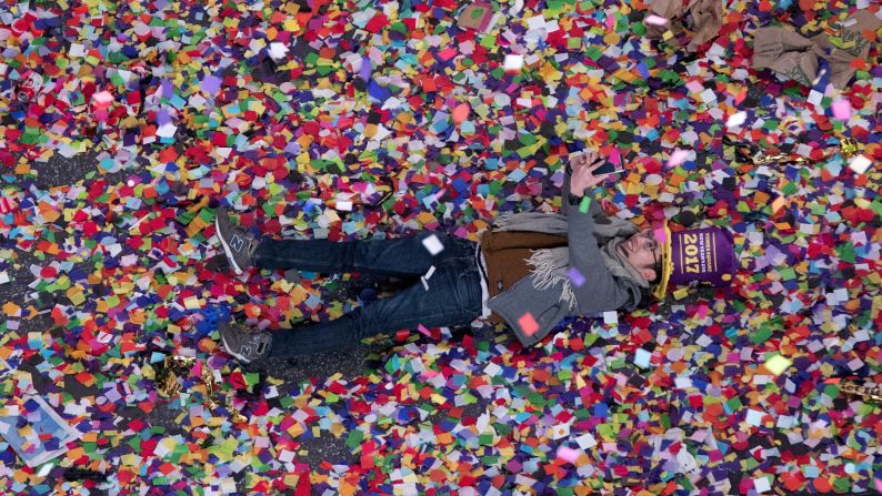 A reveler takes a selfie in the New Year's confetti during the annual celebration in New York's Times Square. <a href="http://www.cnn.com/2016/12/31/world/gallery/new-years-2017/index.html" target="_blank">Photos: New Year's celebrations around the world</a>