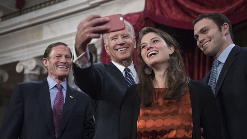 Then-Vice President Joe Biden takes a selfie with US Sen. Richard Blumenthal and Blumenthal's children Claire and David during a swearing-in ceremony on Tuesday, January 3.