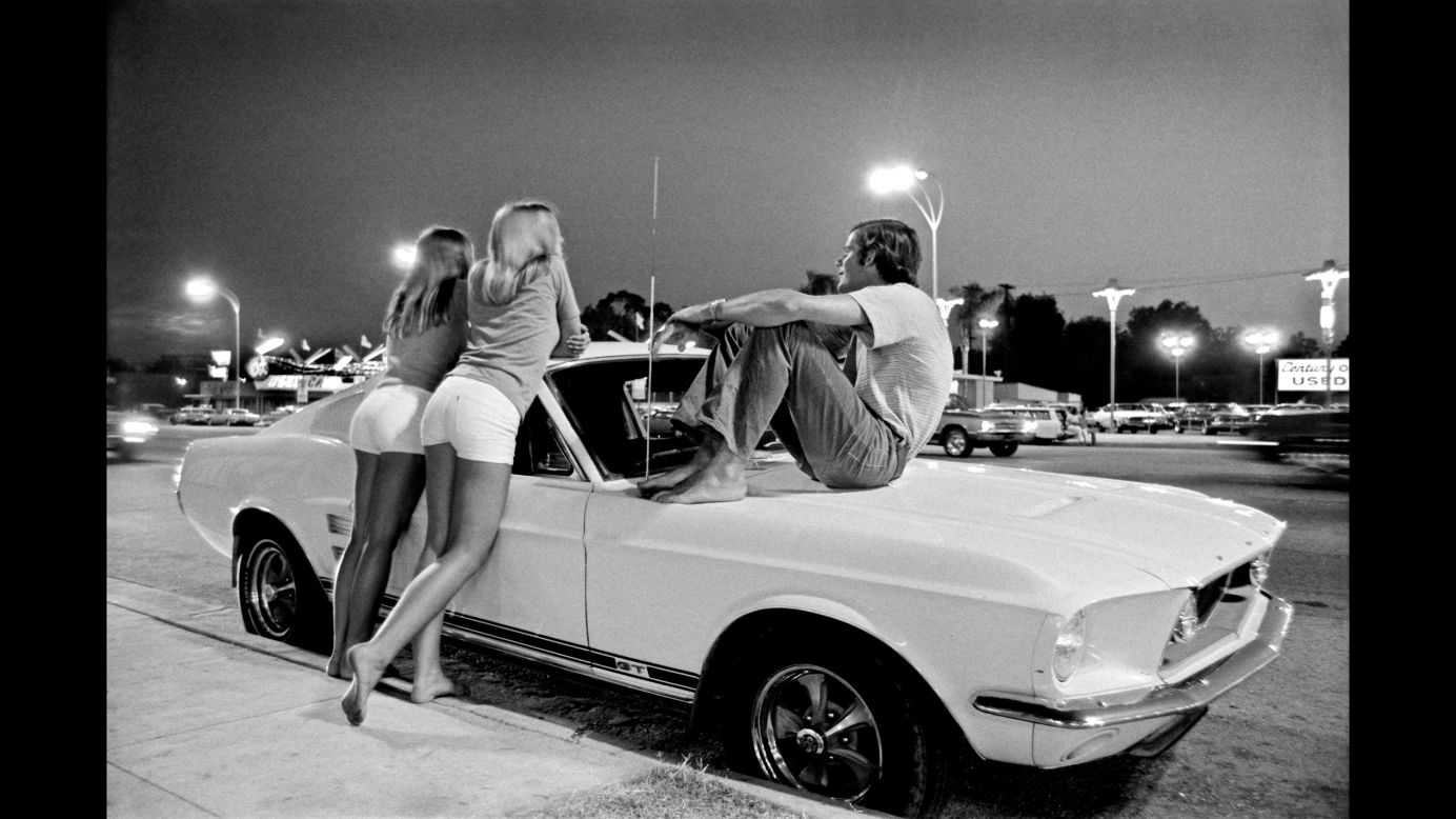 Young people hang out on Los Angeles' Van Nuys Boulevard in summer 1972. Wednesday nights were "cruise nights," recalled photographer Rick McCloskey. "You had everything from your Mustangs to lowriders and hot rods. ... Essentially you were out there to see your friends, show off your car and just sort of <em>be there</em>. It was the place for young people to be." McCloskey's photos are part of <a href="http://www.rarebirdbooks.com/los-angeles-in-the-1970s/" target="_blank" target="_blank">"Los Angeles in the 1970s,"</a> a collection of essays recently published by Rare Bird Books.