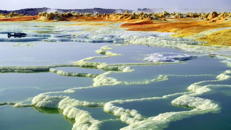 <strong>Dallol, Ethiopia:</strong> A sulfur lake is pictured in Ethiopia's Danakil Depression. At 100 meters below sea level, it's one of the hottest places on Earth. Temperatures here have been known to reach 125 F (51.6 C). 