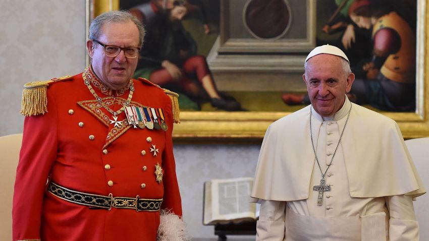 Pope Francis (R) stands with Robert Matthew Festing, Prince and Grand Master of the Sovereign Order of Malta during a private audience on June 23, 2016 at the Vatican. / AFP / POOL / GABRIEL BOUYS (Photo credit should read GABRIEL BOUYS/AFP/Getty Images)
