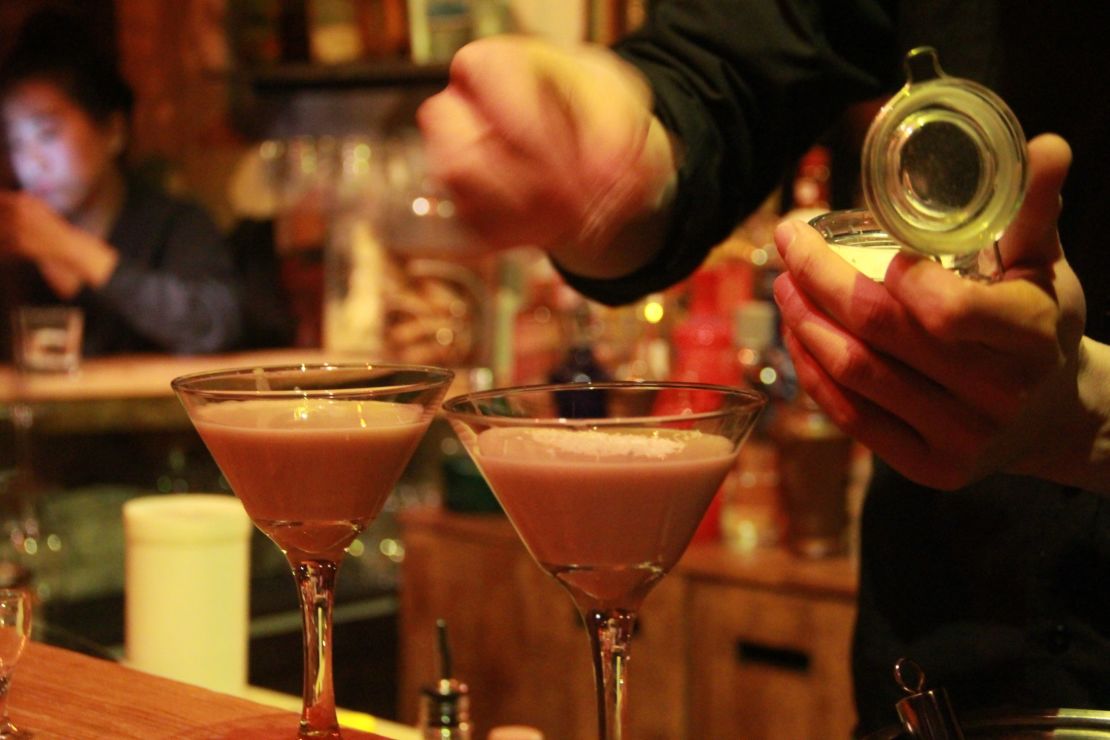 A bartender in Capital Spirits prepares the baijiu-based "Moutai Coco Cream."