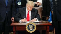 President Donald Trump signs an executive order for border security and immigration enforcement improvements, Wednesday, Jan. 25, 2017, at the Homeland Security Department in Washington.  (AP Photo/Pablo Martinez Monsivais)
