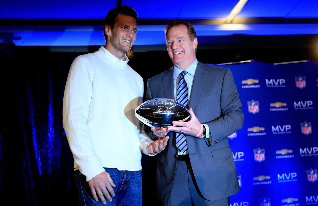 Brady with Goodell and the Super Bowl XLIX MVP trophy during a press conference folowing the New England Patriots Super Bowl win over the Seattle Seahawks on February 2, 2015.