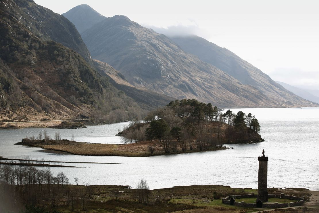 A view of the Glenfinnan Monument with Loch Shiel behind.