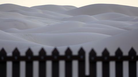 This 15-foot border fence that sits atop sand dunes at the Imperial Sand Dunes in California is known as the "floating fence." It moves with the sand as winds shift. According to Border Patrol agents, immigrants and drug smugglers attempt to cross here daily.