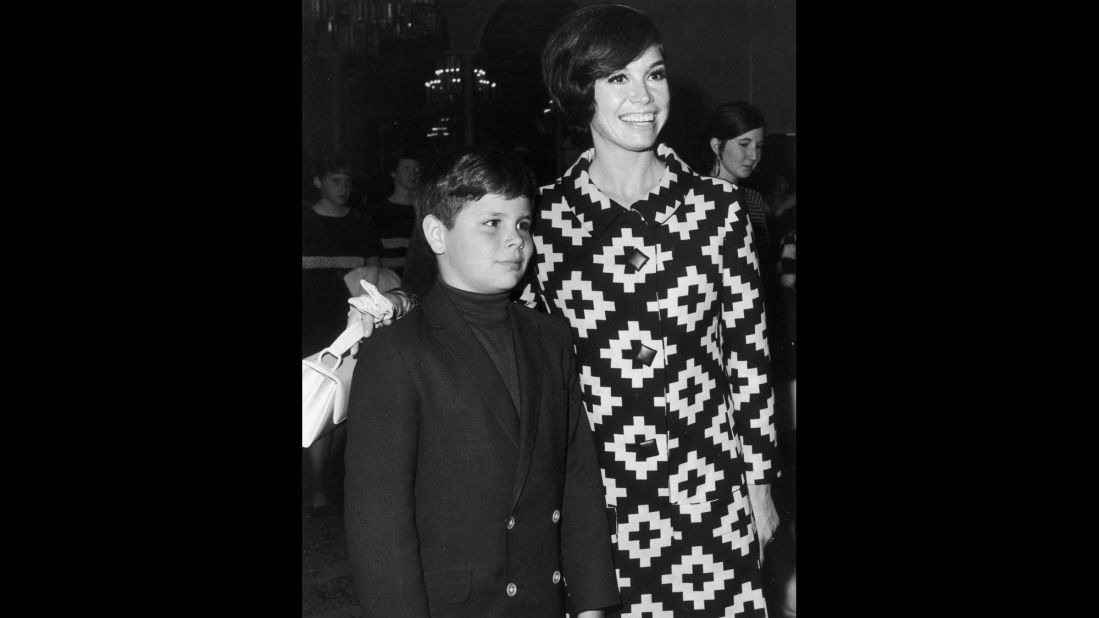 Moore puts her arm around her son, Richard, at a Teach Foundation benefit in 1968. Richard, Moore's only child, died in 1980 after he accidentally shot himself while handling a shotgun.