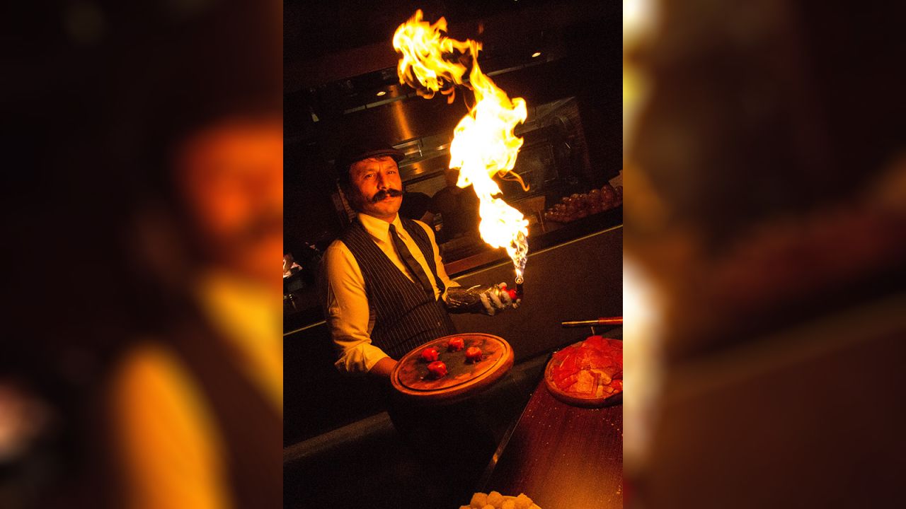 <strong>On fire: </strong>One of Nusr-et's signature dishes, beef sushi, is cooked table-side by blowtorch.  