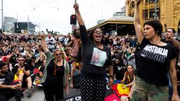 MELBOURNE, AUSTRALIA - JANUARY 26 : Australian Actress Shareena Clanton (2nd R) raises her hand, during a protest organized by Aboriginal rights activists on Australia Day in Melbourne, Australia on January 26, 2017. "Australia Day" is named by some as "Invasion Day" due to the dispossession of Indigenous land and the arrival of the First Fleet's at Port Jackson, Sydney, Australia in 1788. (Photo by Asanka Brendon Ratnayake/Anadolu Agency/Getty Images)