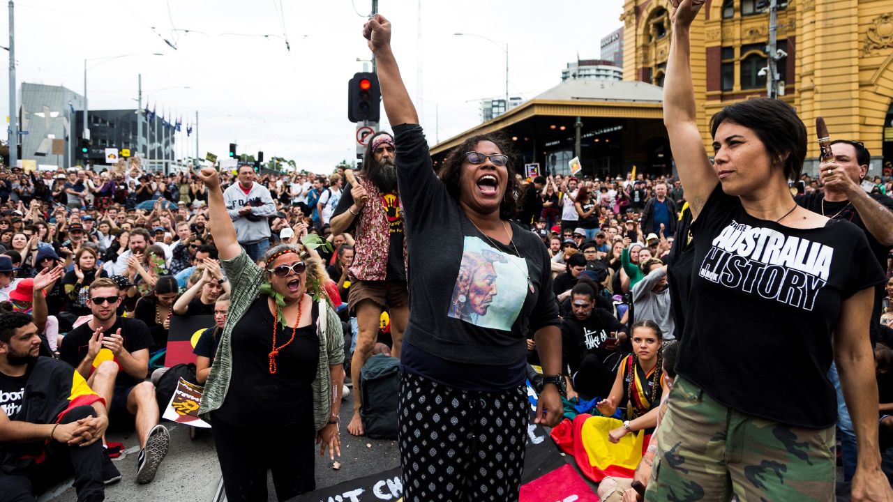 Australian Actress Shareena Clanton raises her hand during a protest organized by Aboriginal rights activists on Australia Day in Melbourne, Australia on January 26, 2017. 