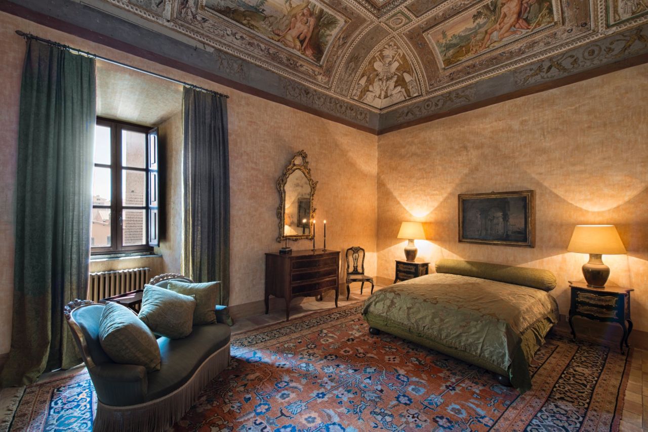 The spacious Benvenuto Cellini Suite features a living room, bedroom, kitchen and bathroom within the Residenza Principi Ruspoli Cerveteri.