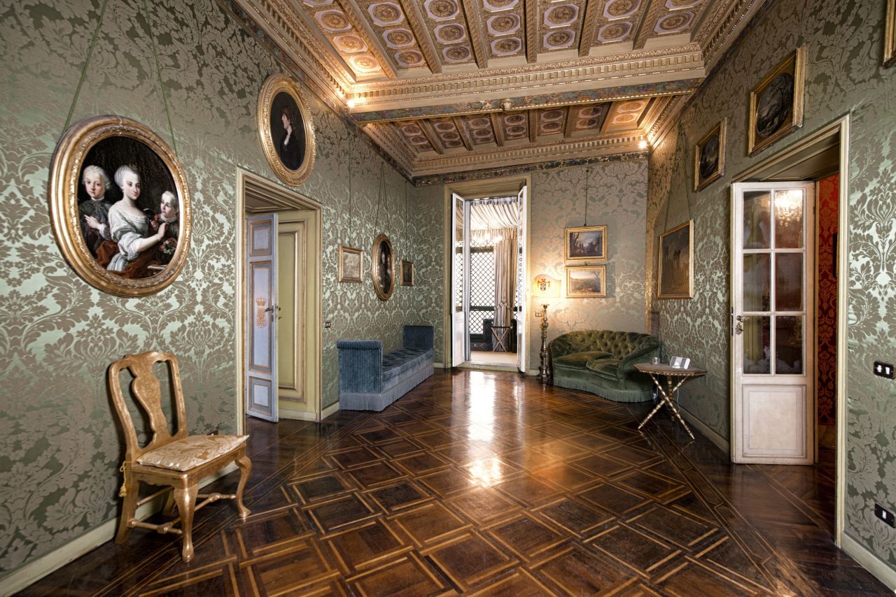 Gilt, damask-covered walls, parquet floors and rich velvet upholstery greet guests at the Ruspoli residence, located near the Spanish Steps in the heart of Rome. 