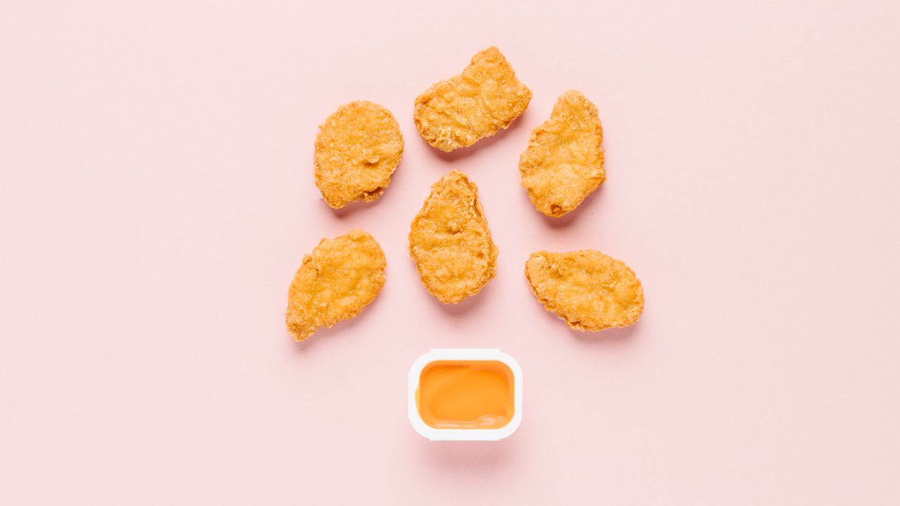 The lowest-sugar option on McDonald's menu is an order of chicken McNuggets, with zero grams. Adding the spicy buffalo dipping sauce, made with cayenne pepper, won't contribute any sugar grams, either.