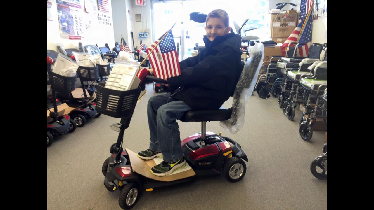 February<strong> </strong>2016:  Spencer in ninth grade at a medical supply store in Chicago. He had just got this scooter, which he used to get to class during high school.