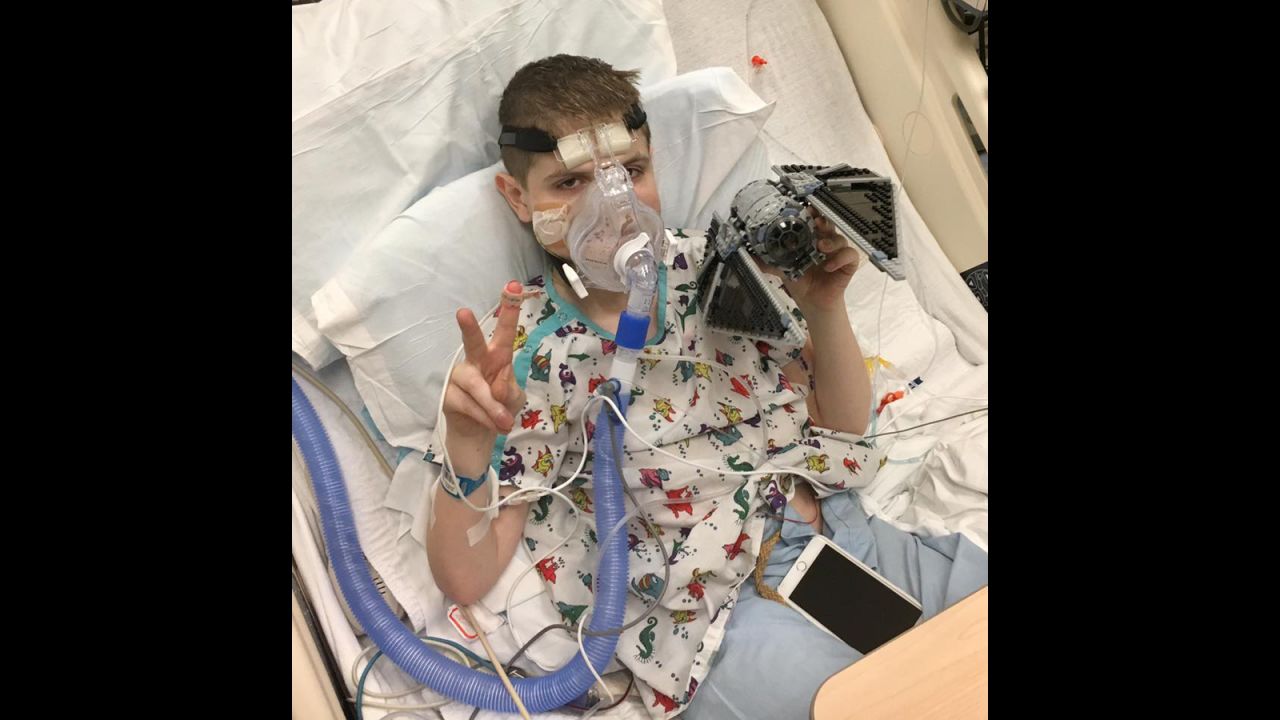 November 2016:  Spencer in the ICU before his transplant. To pass the time, his dad gave him a giant set of the LEGO Star Wars edition to put together, his son's favorite movie series. When this photo was posted on Spencer's Facebook page, many others began sending LEGO sets to the hospital.