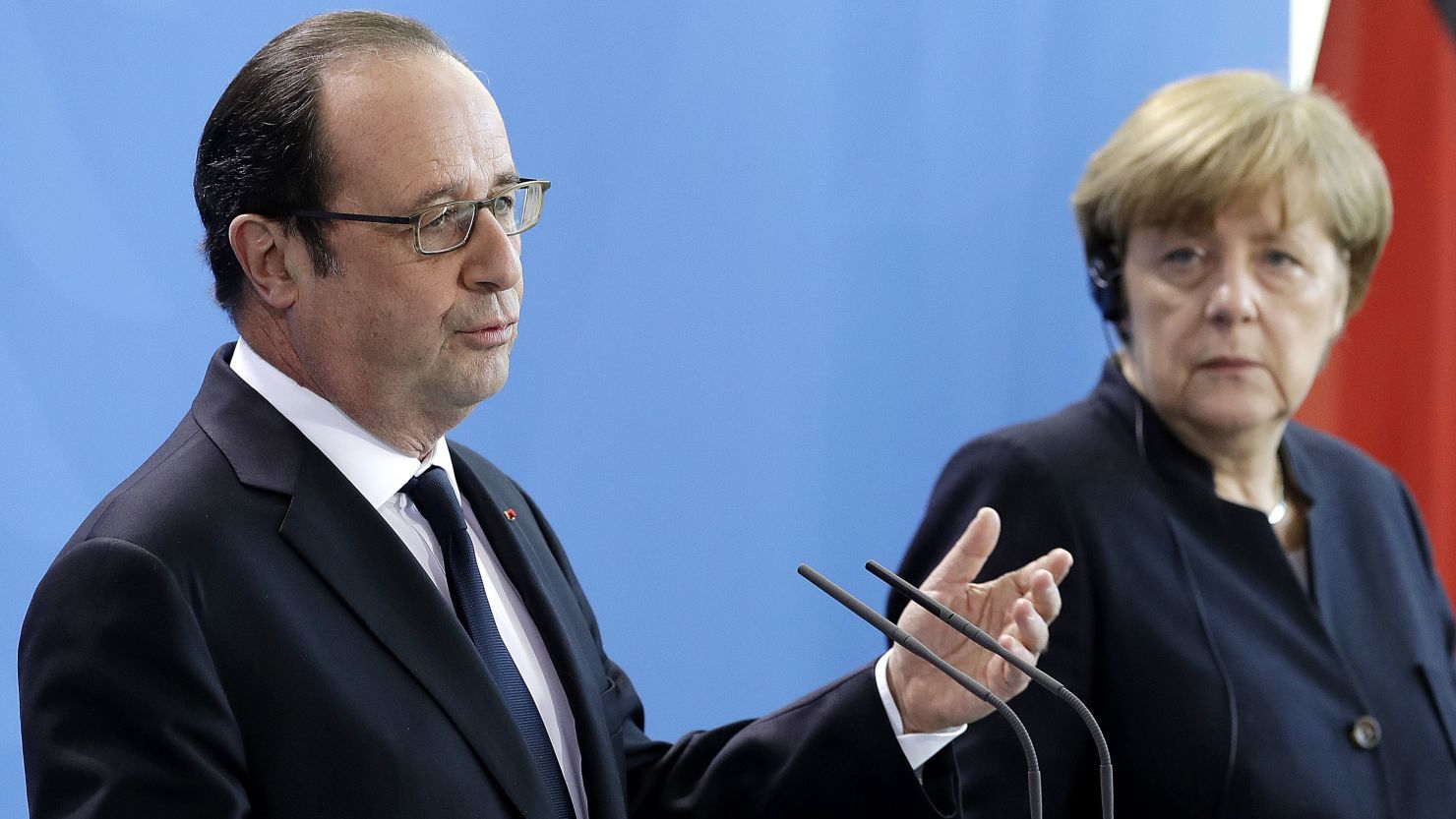 French President François Hollande and German Chancellor Angela Merkel face reporters Friday in Berlin.