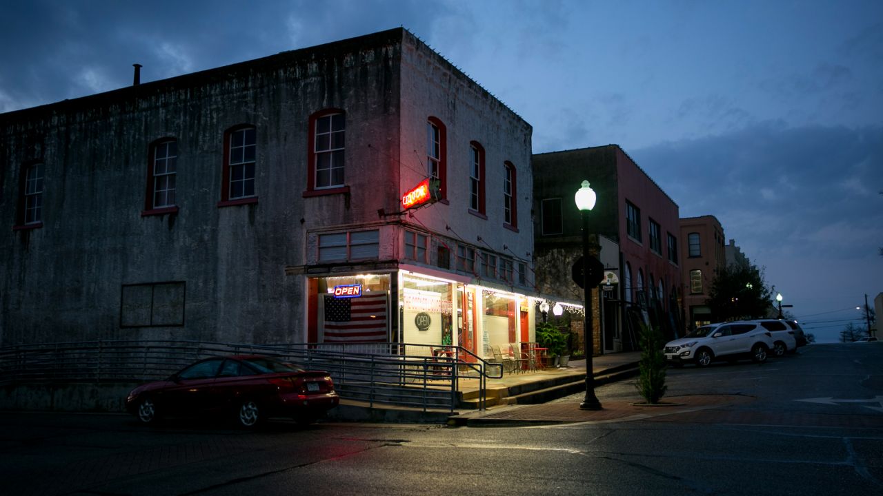 Night falls on the Corner Liquor Store, which has been serving Brenham since the 1940s.