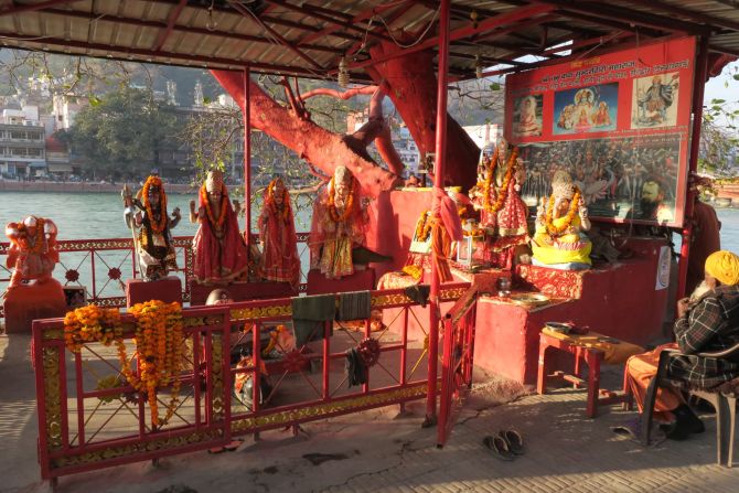 <strong>Haridwar: </strong>A tree is converted into a red temple on the Ganges in the holy city of Haridwar, a one-hour drive from Rishikesh. 