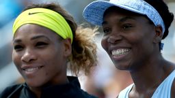 MONTREAL, QC - AUGUST 09:  (L-R) Serena Williams of the USA and Venus Williams of the USA pose before their women's semifinals match in the Rogers Cup at Uniprix Stadium on August 9, 2014 in Montreal, Canada.  (Photo by Streeter Lecka/Getty Images)