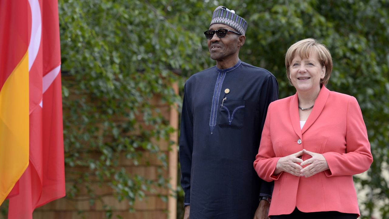 Buhari is greeted by German Chancellor Angela Merkel during the G-7 summit in Germany in June 2015.