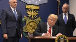 US President Donald Trump signs an executive order alongside US Defense Secretary James Mattis and US Vice President Muike Pence on January 27, 2016 at the Pentagon in Washington, DC.
 MANDEL NGAN/AFP/Getty Images