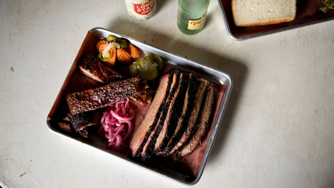 House made pickles, onions and jalapenos accompany pork ribs and brisket at Truth BBQ in Brenham.
