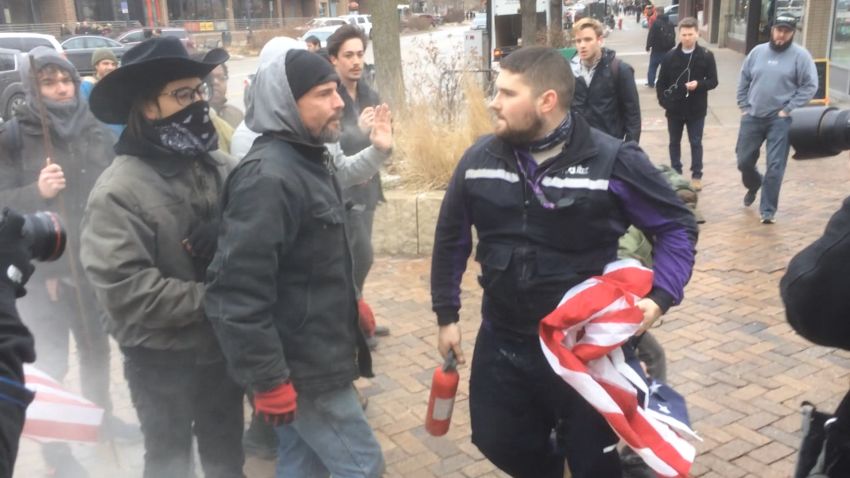 Street fight breaks out over flag burning | CNN