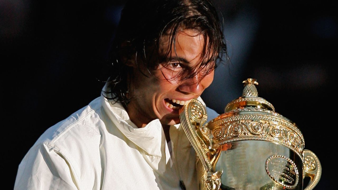 Third time lucky: Nadal celebrates winning Wimbledon in 2008, having lost to Federer in the two previous years. 