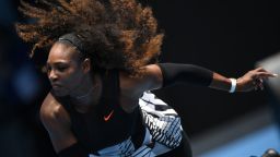 Serena Williams of the US serves against Switzerland's Belinda Bencic during their women's singles match on day two of the Australian Open tennis tournament in Melbourne on January 17, 2017. / AFP / GREG WOOD / IMAGE RESTRICTED TO EDITORIAL USE - STRICTLY NO COMMERCIAL USE        (Photo credit should read GREG WOOD/AFP/Getty Images)