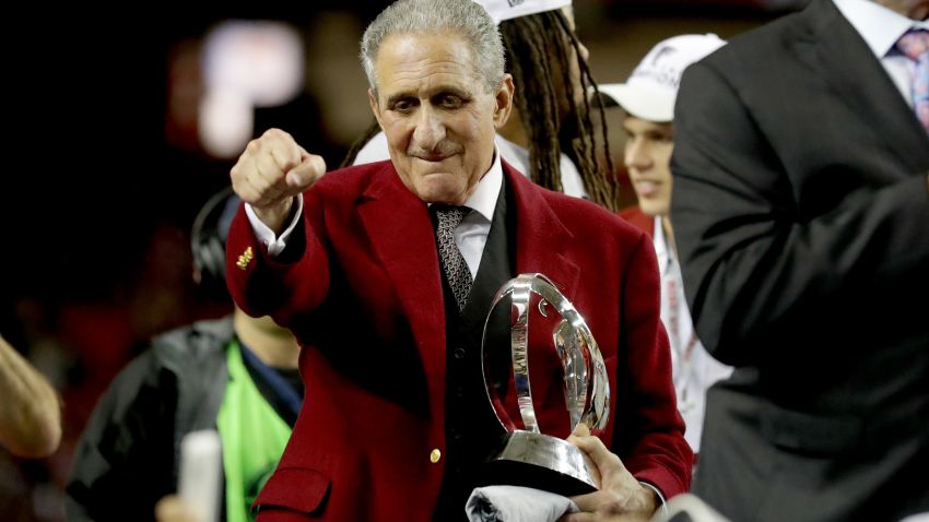 ATLANTA, GA - JANUARY 22: Atlanta Falcons owner Arthur Blank holds the George Halas trophy after defeating the Green Bay Packers in the NFC Championship Game at the Georgia Dome on January 22, 2017 in Atlanta, Georgia. The Falcons defeated the Packers 44-21. (Photo by Streeter Lecka/Getty Images)