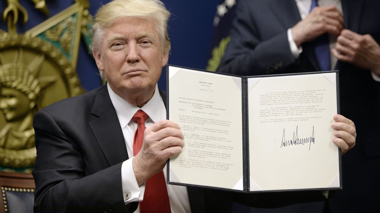 ARLINGTON, VA - JANUARY 27: U.S. President Donald Trump signs executive orders in the Hall of Heroes at the Department of Defense on January 27, 2017 in Arlington, Virginia. Trump signed two orders calling for the "great rebuilding" of the nation's military and the "extreme vetting" of visa seekers from terror-plagued countries. (Photo by Olivier Douliery-Pool/Getty Images)