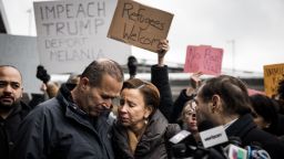 Hameed Khalid Darweesh, left, stands at a press conference with Congresswoman Nydia Velazquez at John F. Kennedy International Airport in New York, NY on Saturday, January 28, 2017.  