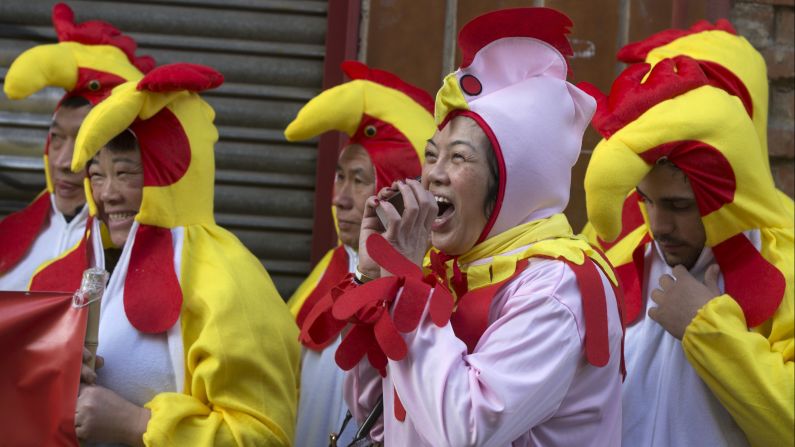 Revelers in Madrid, Spain, celebrate the year of the rooster.