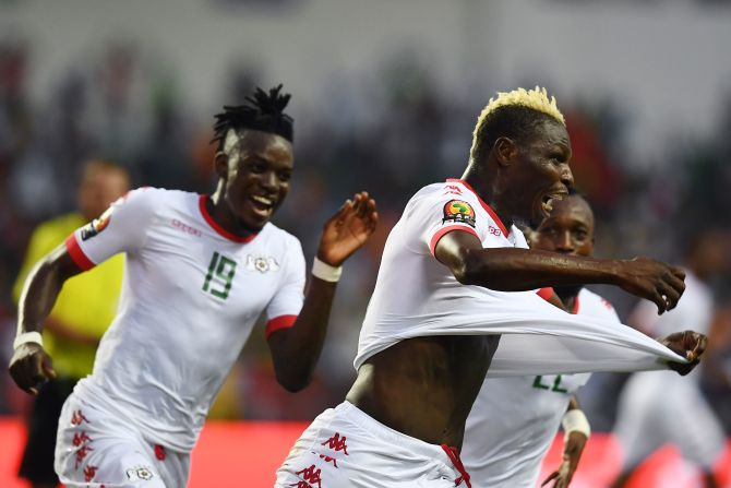 Aristide Bance celebrates scoring Burkina Faso's opener against Tunisia in Libreville. 
