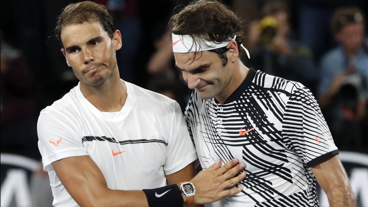 Switzerland's Roger Federer, right, is congratulated by Spain's Rafael Nadal.