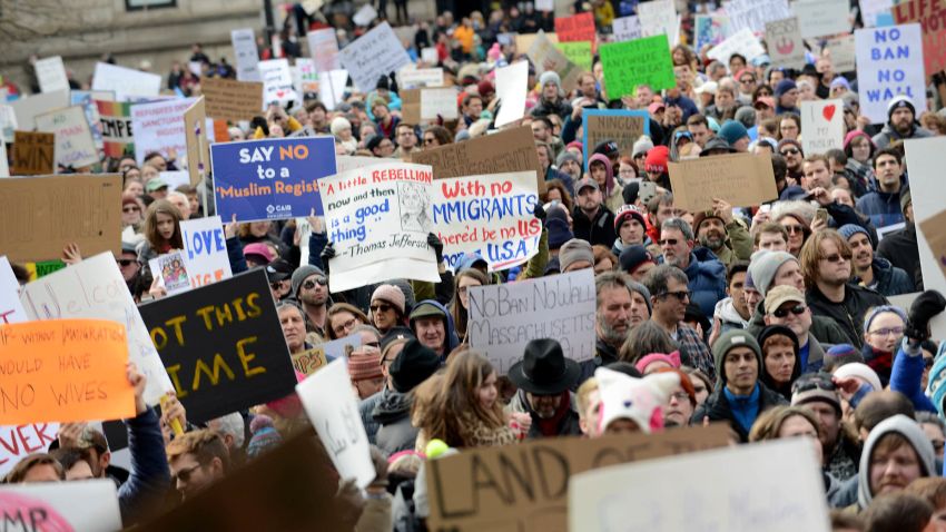People gather in Copley Square to protest the muslim immigration ban enacted by President Trump on January 29, 2017 in Boston, Massachusetts. On Saturday night two federal judges issued a temporary emergency order halting part of the ban.