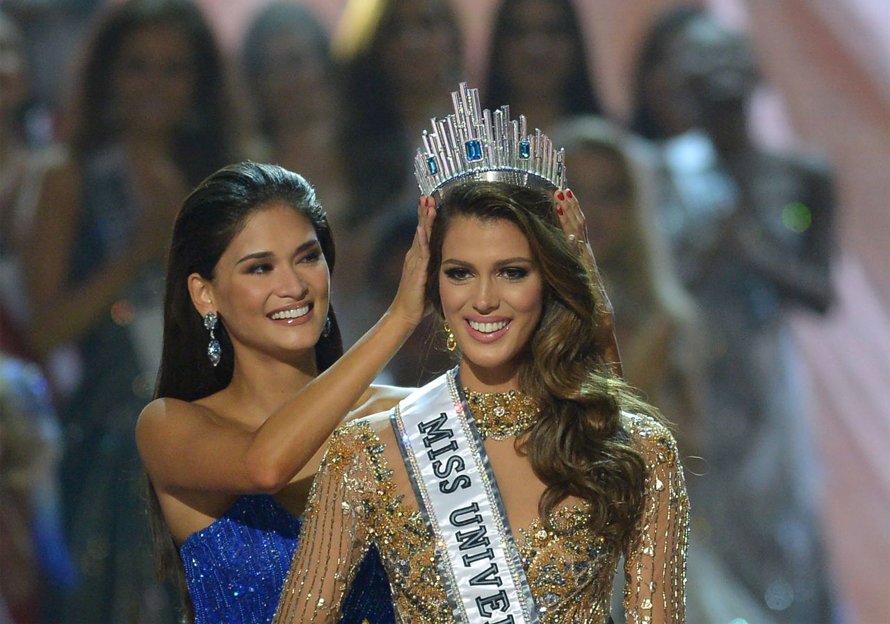 Contestant Iris Mittenaere of France is crowned the new Miss Universe by former Miss Universe Pia Wurtzbach of the Philippines.