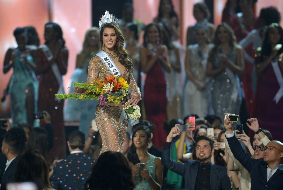 Mittenaere walks on stage after being crowned the winner of the Miss Universe pageant at the Mall of Asia Arena in Manila.