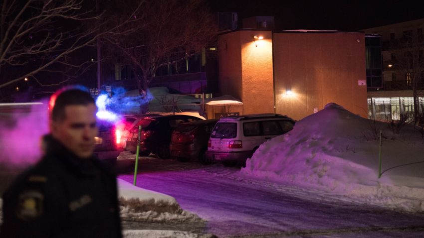 Canadian police officers respond to a shooting in a mosque at the Québec City Islamic cultural center on Sainte-Foy Street in Quebec city on January 29, 2017.
Two arrests have been made after five people were reportedly shot dead in an attack on a mosque in Québec City, Canada. / AFP / Alice Chiche (Photo credit should read ALICE CHICHE/AFP/Getty Images)