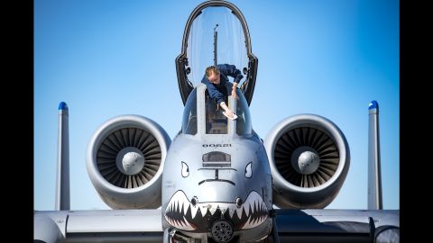 Senior Airman Felicia Anderson, 74th Aircraft Maintenance Unit crew chief, cleans cockpit glass on an A-10C Thunderbolt II on January 25 at Nellis Air Force Base, Nevada.