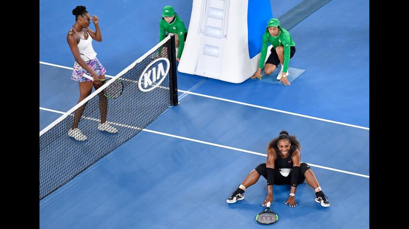 Serena Williams, right, celebrates after defeating her sister Venus <a href="index.php?page=&url=http%3A%2F%2Fwww.cnn.com%2F2017%2F01%2F28%2Ftennis%2Fvenus-williams-serena-williams-tennis-graf%2F" target="_blank">to win her seventh Australian Open</a> on Saturday, January 28. Williams has now won 23 major titles, an Open-era record.