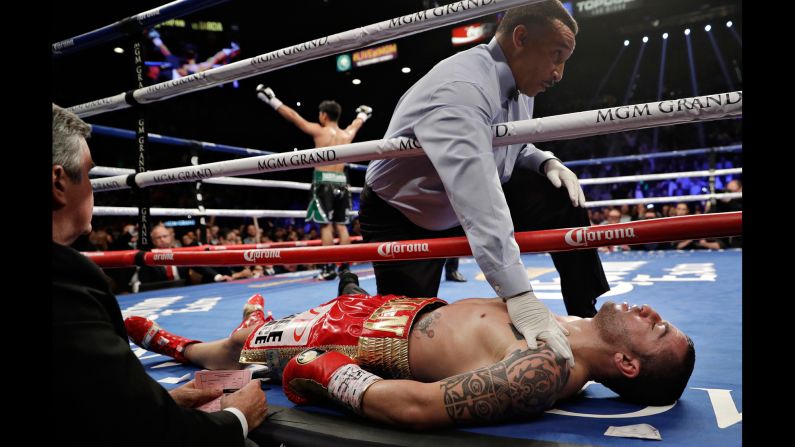 Dejan Zlaticanin lies on the mat after he was knocked out by Mikey Garcia in their lightweight title bout on Saturday, January 28. Both boxers came into the fight undefeated. 