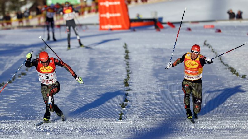 Germany's Johannes Rydzek, left, edges his countryman, Eric Frenzel, during a Nordic combined race in Seefeld, Austria, on Friday, January 27.