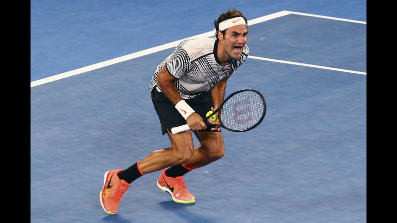 Roger Federer reacts after defeating his longtime rival, Rafael Nadal, <a href="index.php?page=&url=http%3A%2F%2Fwww.cnn.com%2F2017%2F01%2F29%2Ftennis%2Ffederer-nadal-australian-open-final-tennis%2Findex.html" target="_blank">to win the Australian Open final</a> on Sunday, January 29. It was Federer's first Grand Slam title since Wimbledon in 2012. Federer has now won 18 major titles -- the most of any man in the Open era.
