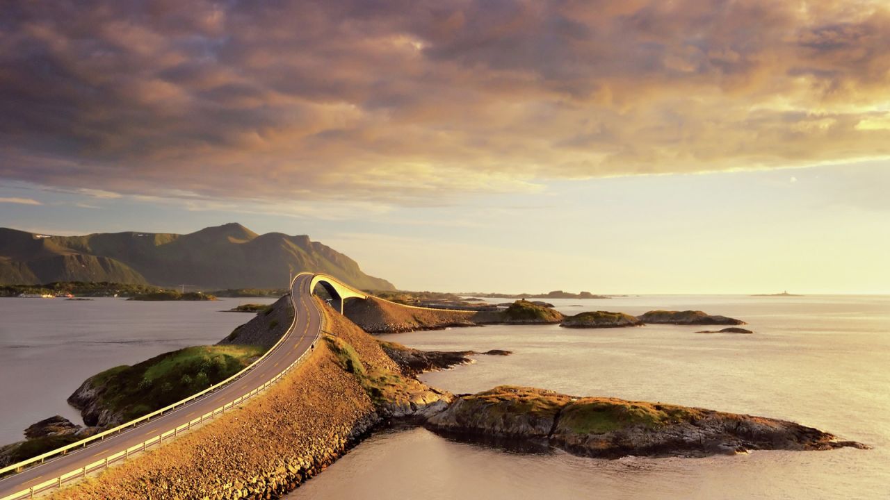 <strong>The Atlantic Road, Norway: </strong>Belly-flips and bridges make up this high-octane drive along the Norwegian coastline. Get ready to see unusual birds flying overhead, while seals and whales swim off the coastline. Plus, at dusk there's a wickedly orange sunset.