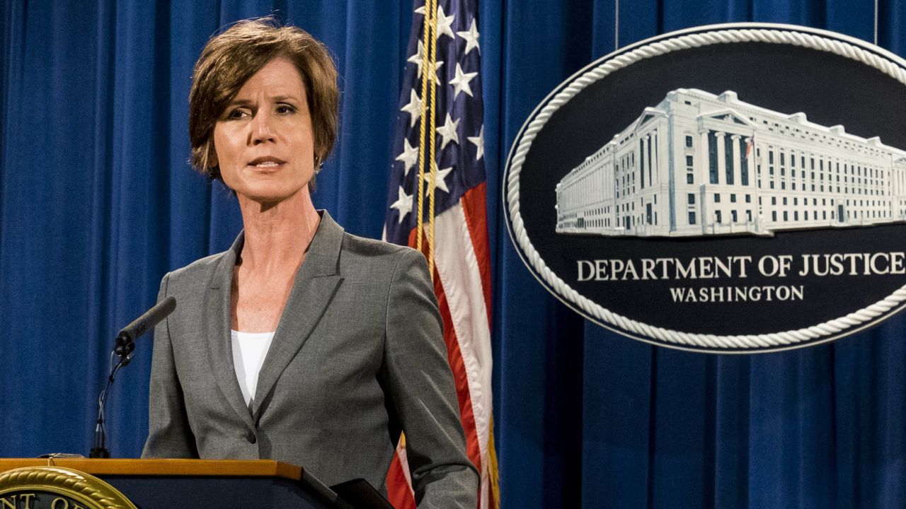 Environmental Protection Agency Administrator Gina McCarthy looks on as Deputy Attorney General Sally Q. Yates speaks during a press conference at the Department of Justice on June 28, 2016 in Washington, DC.