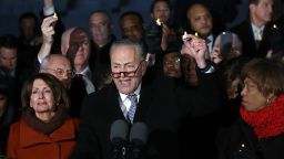 Senate Minority Leader Chuck Schumer (D-NY) and House Minority Leader Nancy Pelosi (D-CA) lead members of Congress during a protest on the steps of the U.S. Supreme Court January 30, 2017 in Washington, DC.