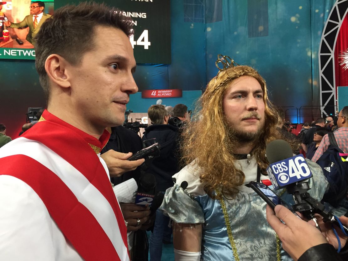 Austrian sportscaster Phillip Hajszan, left, says he has dressed up for Super Bowl media days five times.