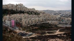 A picture taken on January 26, 2017 shows new apartments under construction in the Israeli settlement of Har Homa (foreground-L) situated in East Jerusalem, in front of the West Bank city of Bethlehem (background-R)
Israeli officials gave final approval Thursday to 153 east Jerusalem settler homes, the deputy mayor said, adding to a sharp increase in such projects since US President Donald Trump took office.