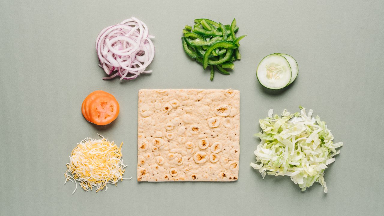 At Subway, an ordinary Veggie Delite sub can be upgraded by ordering it on multigrain flatbread, which is rich in fiber and whole grains. Ask for it to be toasted with shredded Monterey cheddar.